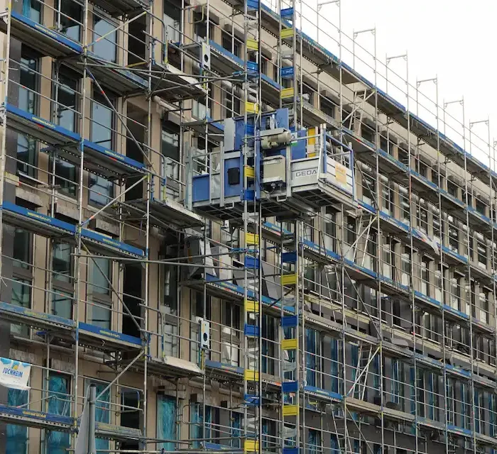 Large commercial scaffolding access system installed on a multi-story Stockton building