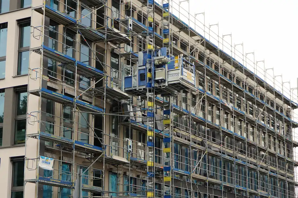 Large commercial scaffolding access system installed on a multi-story Stockton building