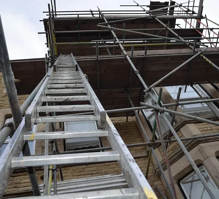 Safe scaffolding ladder access system installed for exterior building maintenance in Stockton